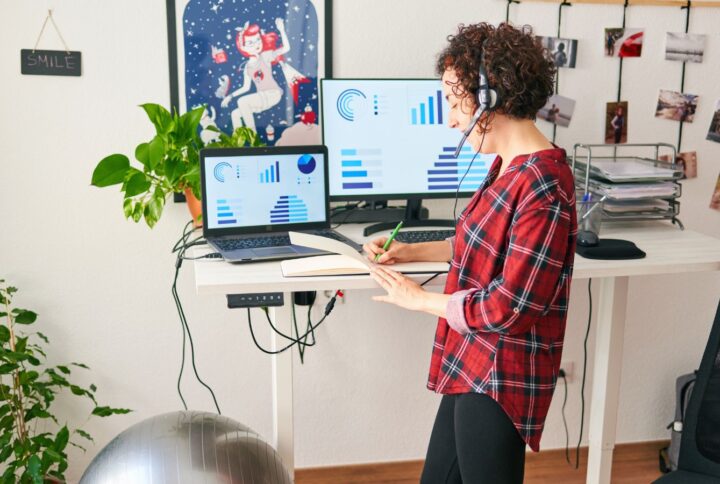 woman using a standing desk