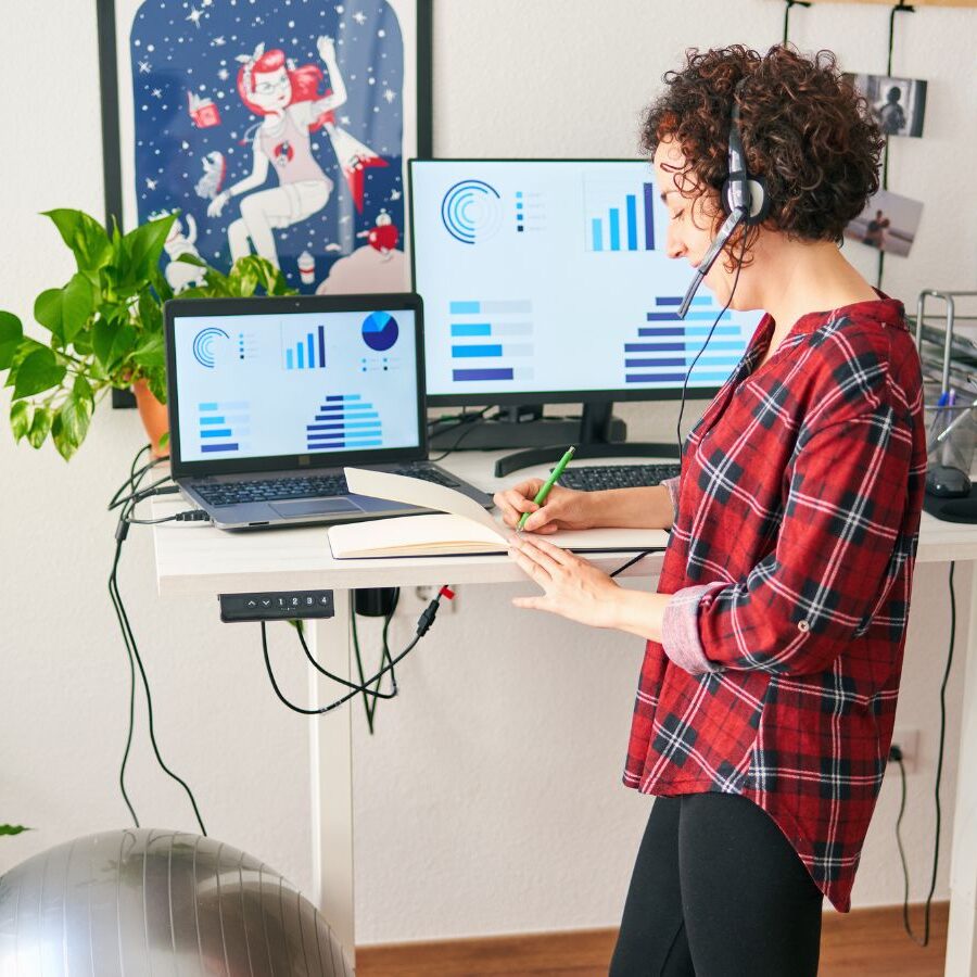 woman using a standing desk