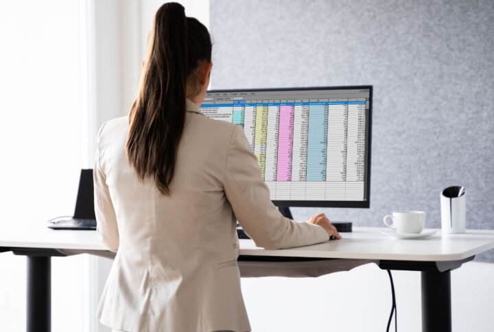 woman working standing desk